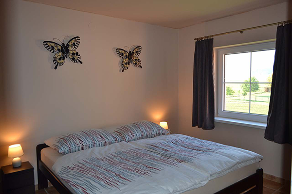 Slaapkamer - Vakantiehuis Domecek S Vyhledem